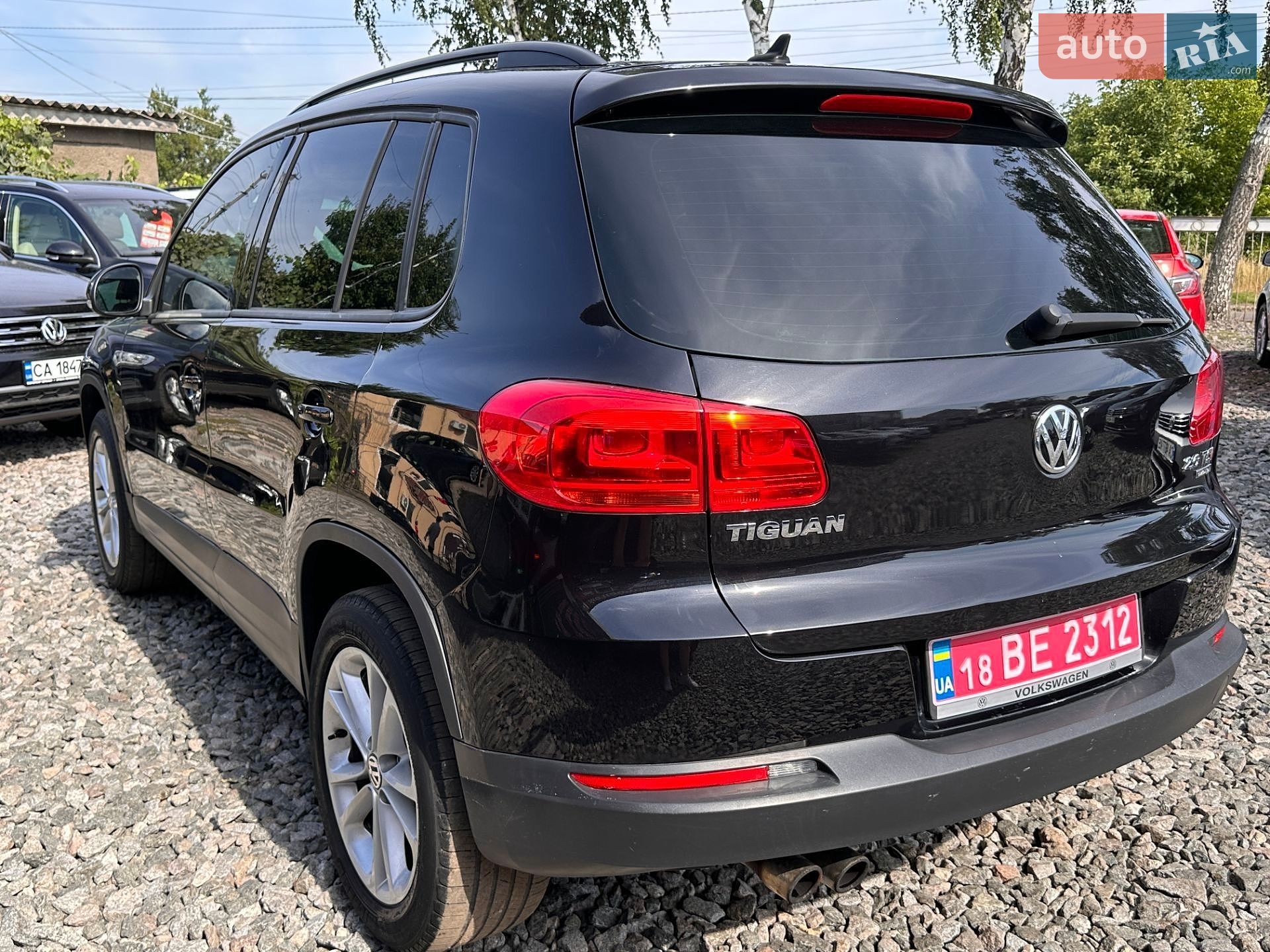 Volkswagen Tiguan 2014 VIN WVGJV3AXXEW621460 фото оголошення 12 з 21