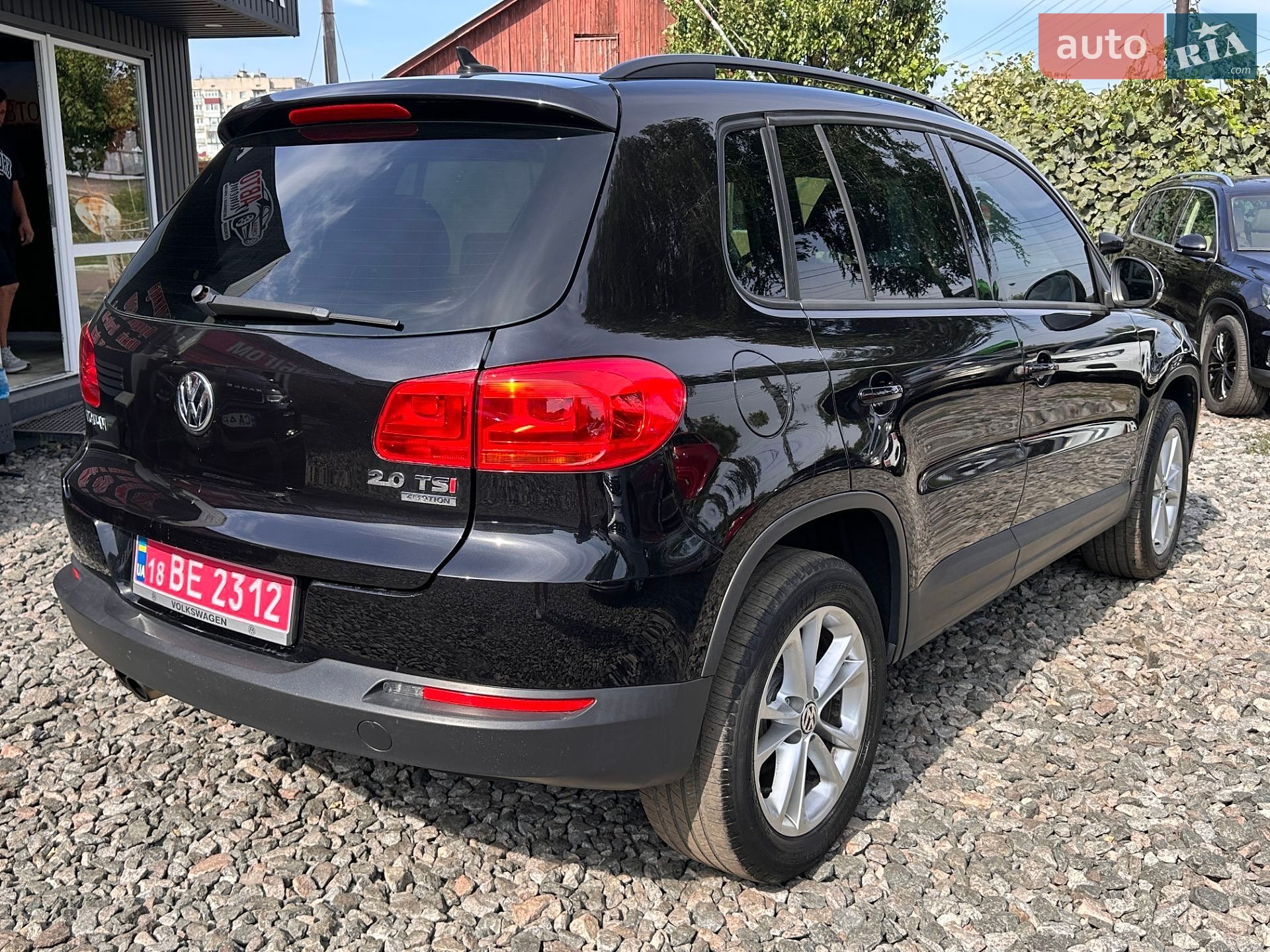 Volkswagen Tiguan 2014 VIN WVGJV3AXXEW621460 фото оголошення 16 з 21