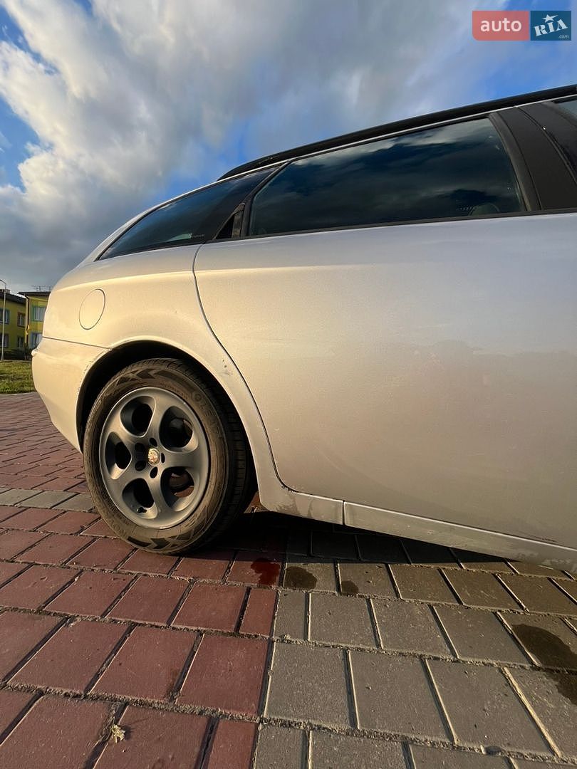 Alfa Romeo 156 2001 VIN ZAR93200001227450 фото оголошення 8 з 27