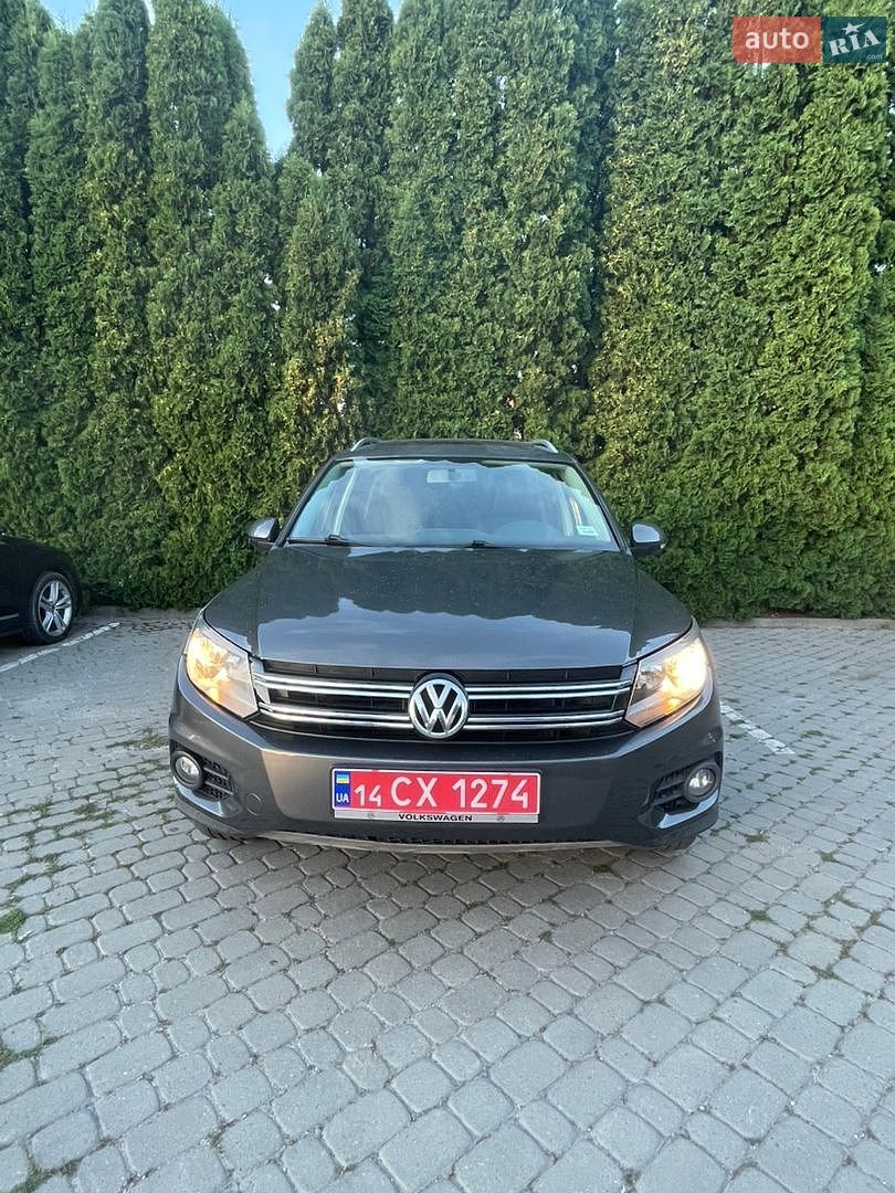Volkswagen Tiguan 2014 VIN WVGAV3AX1EW580572 фото оголошення 2 з 7