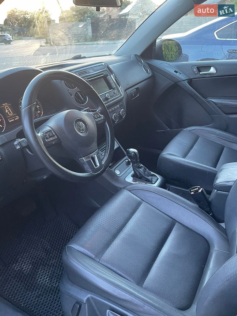 Volkswagen Tiguan 2014 VIN WVGAV3AX1EW580572 фото оголошення 4 з 7