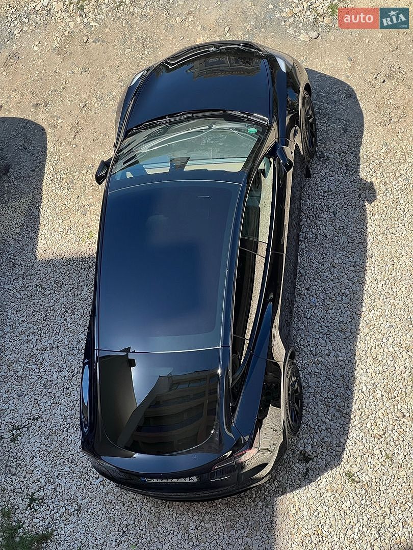 Tesla Model Y 2022 VIN LRWYGCEK5NC464205 фото оголошення 2 з 15