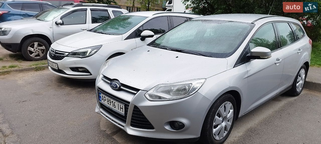 Ford Focus 2013 VIN WF0LXXGCBLDU70416 фото оголошення 2 з 16