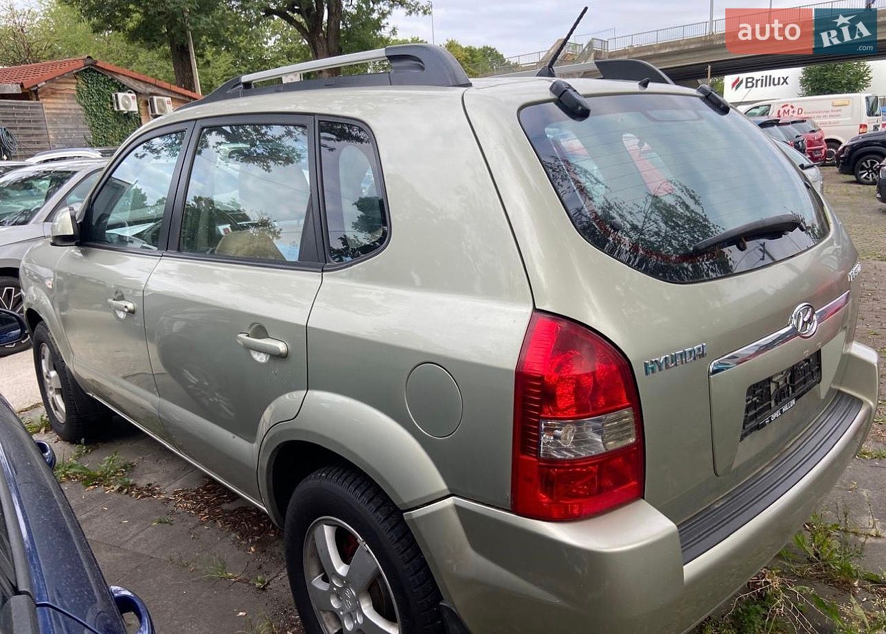 Hyundai Tucson 2007 VIN KMHJN81BP7U680335 фото оголошення 4 з 17