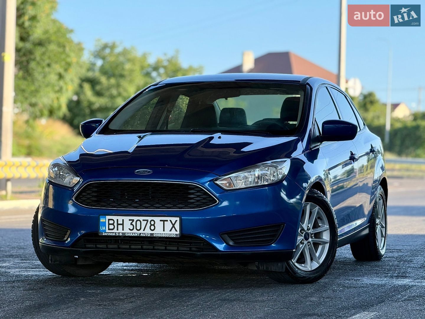Ford Focus 2018 VIN 1FADP3FEXJL303794 фото оголошення 4 з 79
