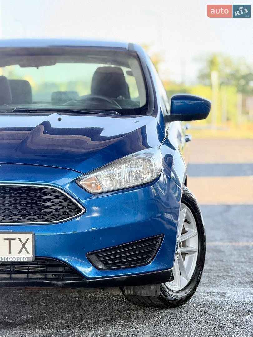 Ford Focus 2018 VIN 1FADP3FEXJL303794 фото оголошення 11 з 79