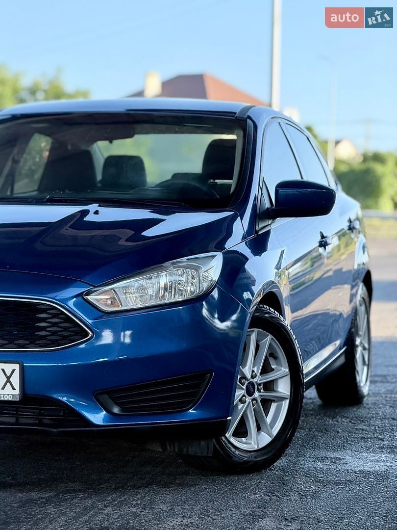 Ford Focus 2018 VIN 1FADP3FEXJL303794 фото оголошення 12 з 79