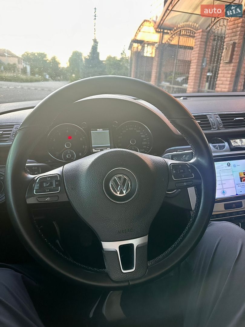 Volkswagen Passat 2011 VIN WVWZZZ3CZCP034434 фото оголошення 9 з 14