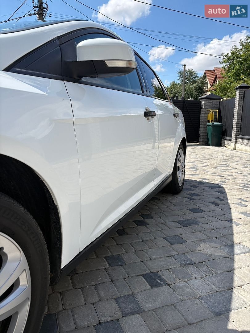 Ford Focus 2013 VIN WF0MXXGCBMDA25364 фото оголошення 4 з 15