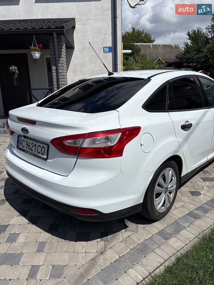 Ford Focus 2013 VIN WF0MXXGCBMDA25364 фото оголошення 8 з 15