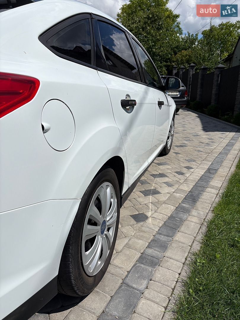 Ford Focus 2013 VIN WF0MXXGCBMDA25364 фото оголошення 9 з 15