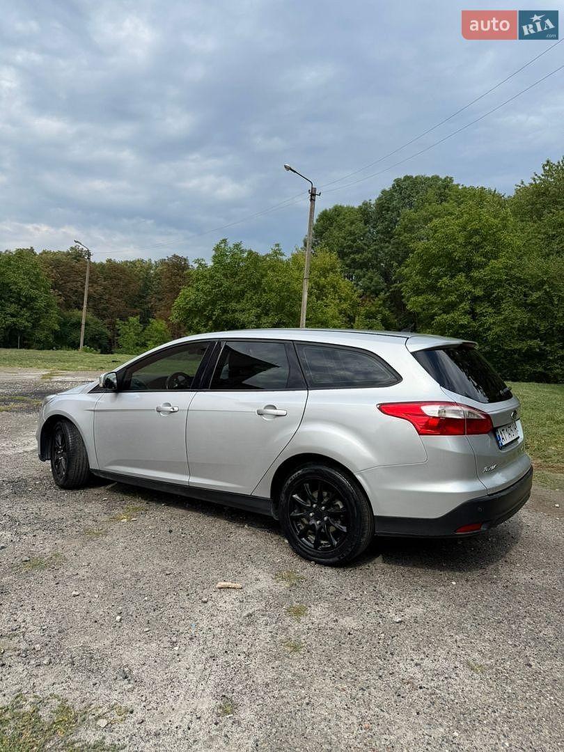 Ford Focus 2014 VIN WF0LXXGCBLEL48205 фото оголошення 7 з 30