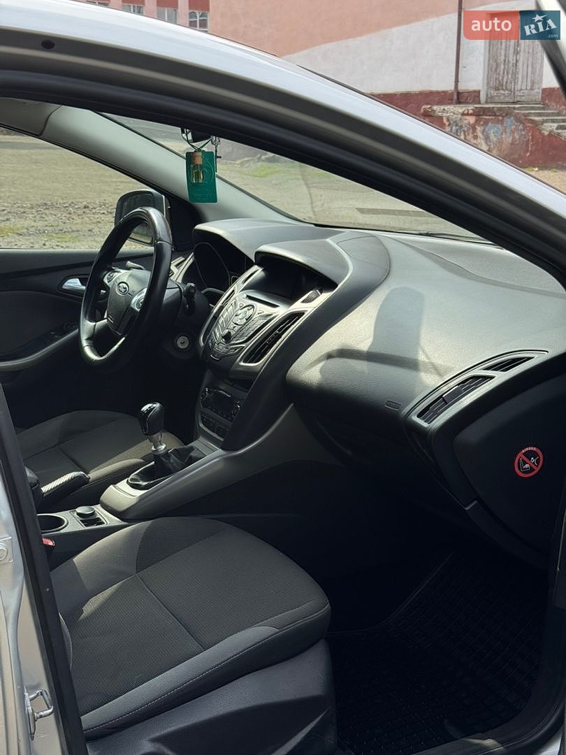 Ford Focus 2014 VIN WF0LXXGCBLEL48205 фото оголошення 25 з 30