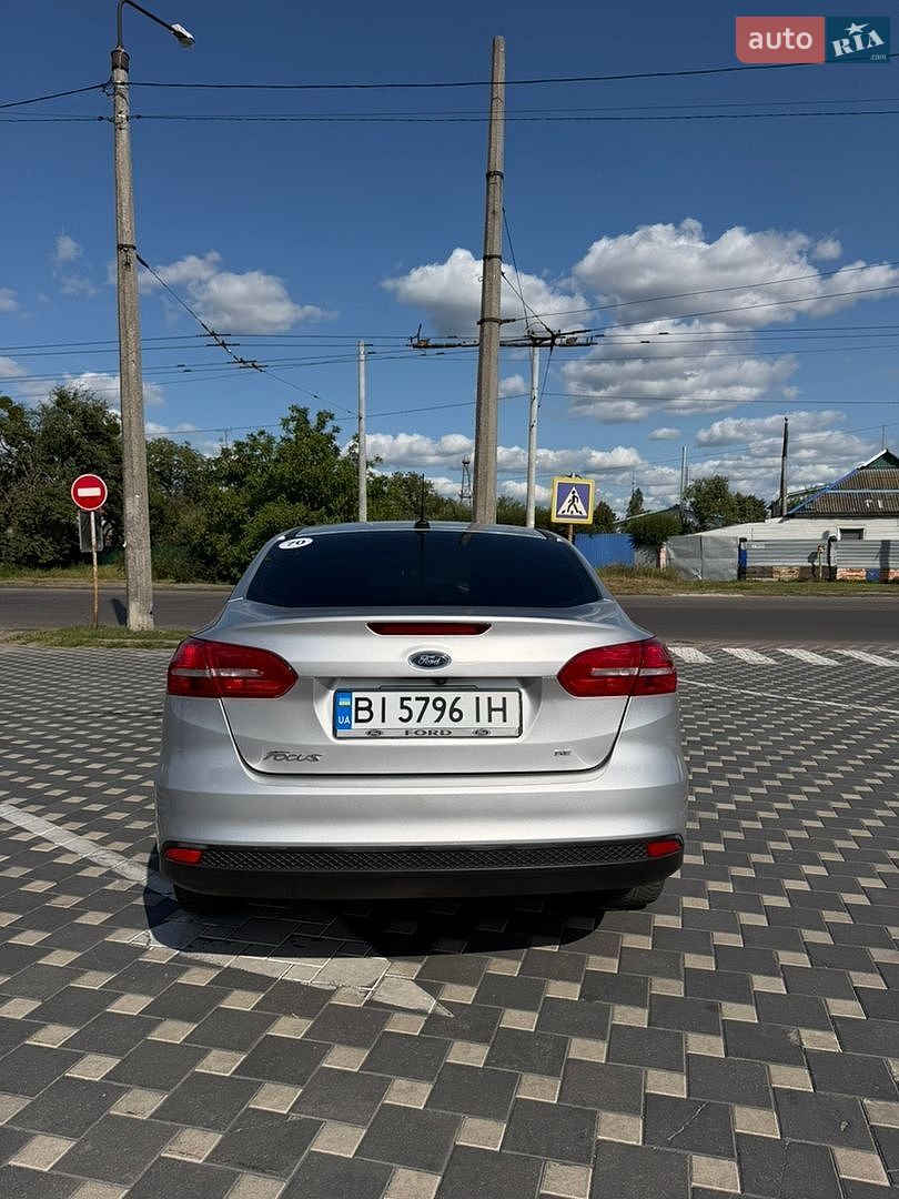 Ford Focus 2018 VIN 1FADP3F28JL291232 фото оголошення 4 з 19