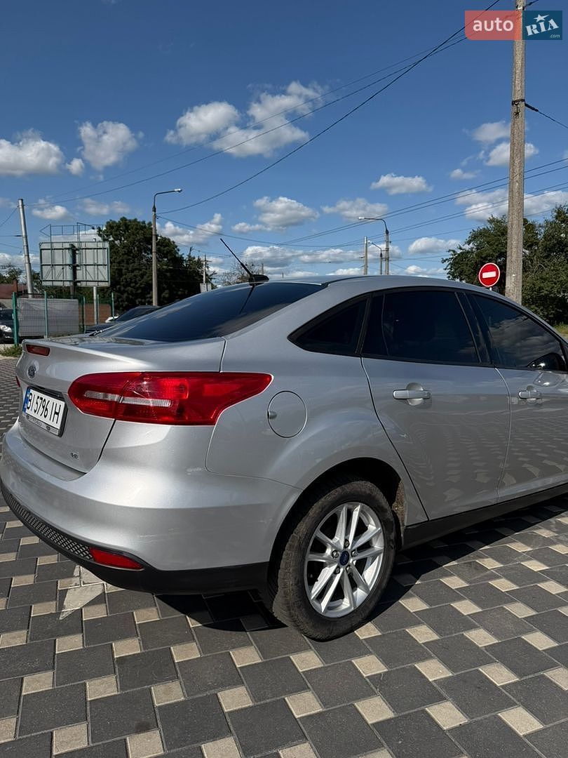 Ford Focus 2018 VIN 1FADP3F28JL291232 фото оголошення 6 з 19