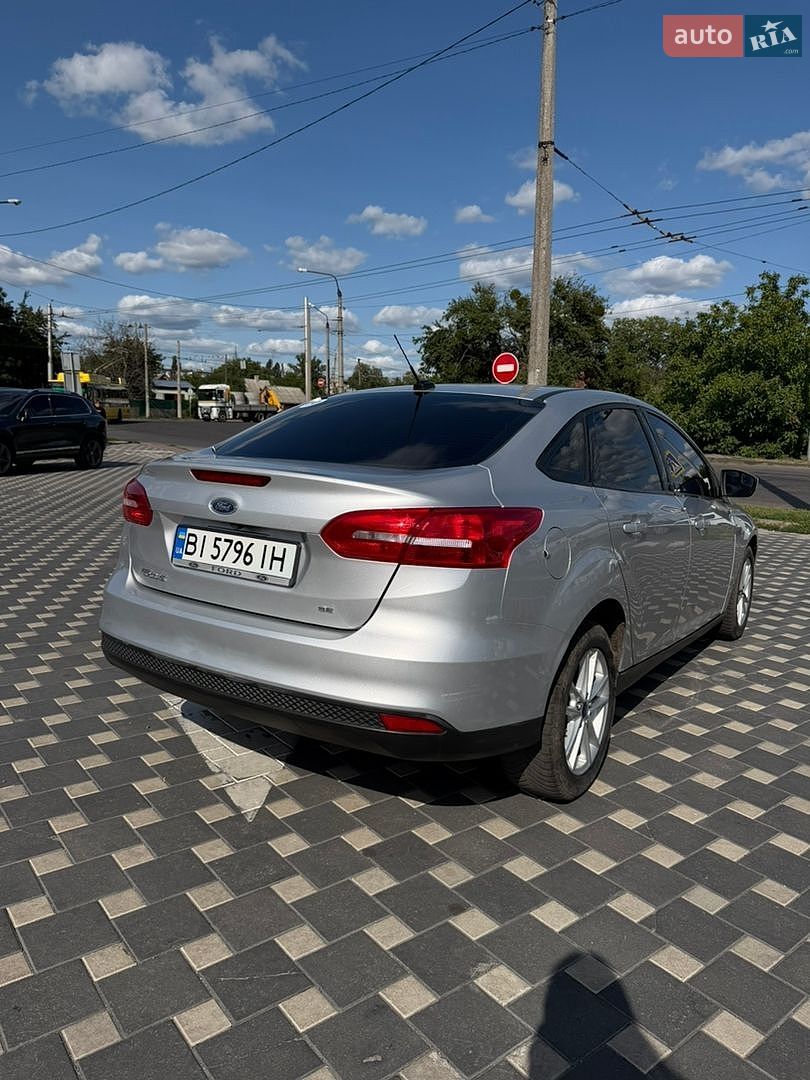 Ford Focus 2018 VIN 1FADP3F28JL291232 фото оголошення 9 з 19