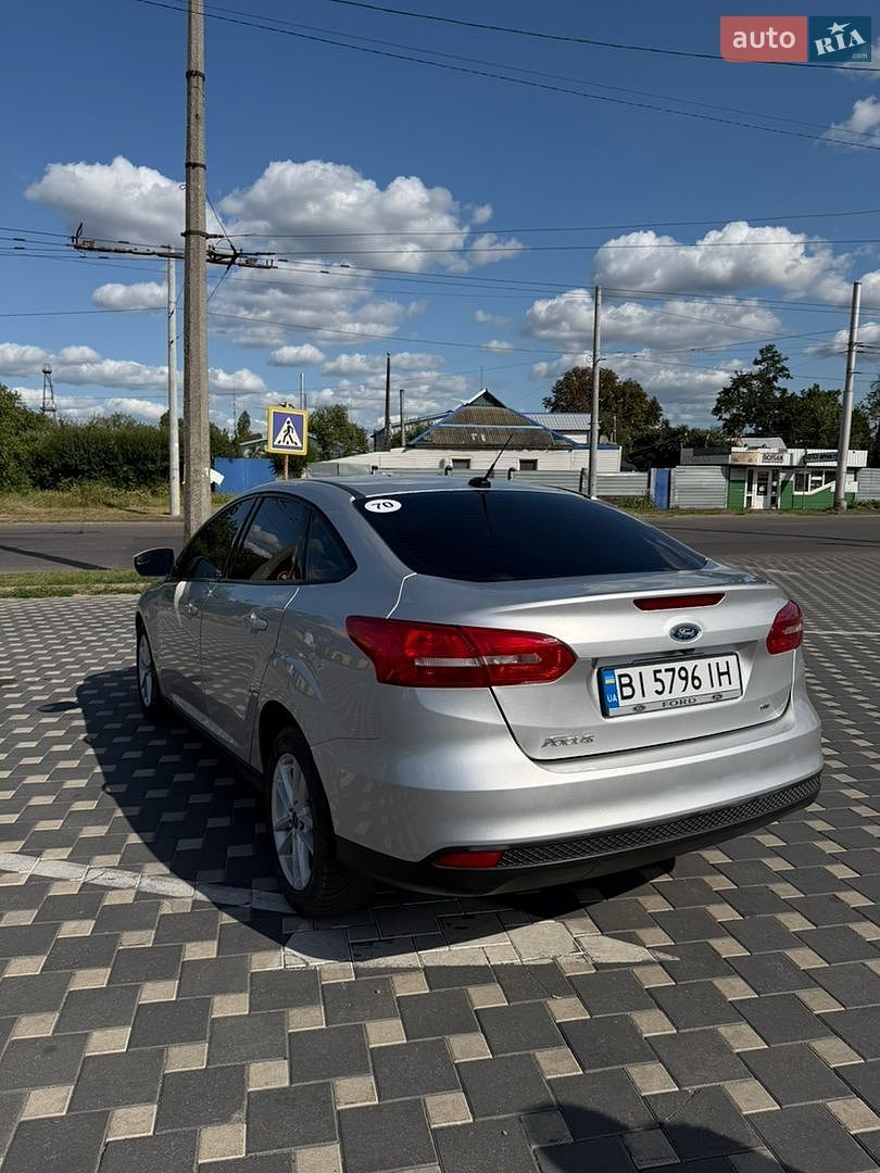 Ford Focus 2018 VIN 1FADP3F28JL291232 фото оголошення 11 з 19