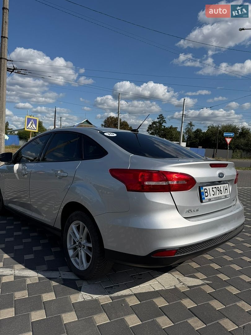 Ford Focus 2018 VIN 1FADP3F28JL291232 фото оголошення 12 з 19