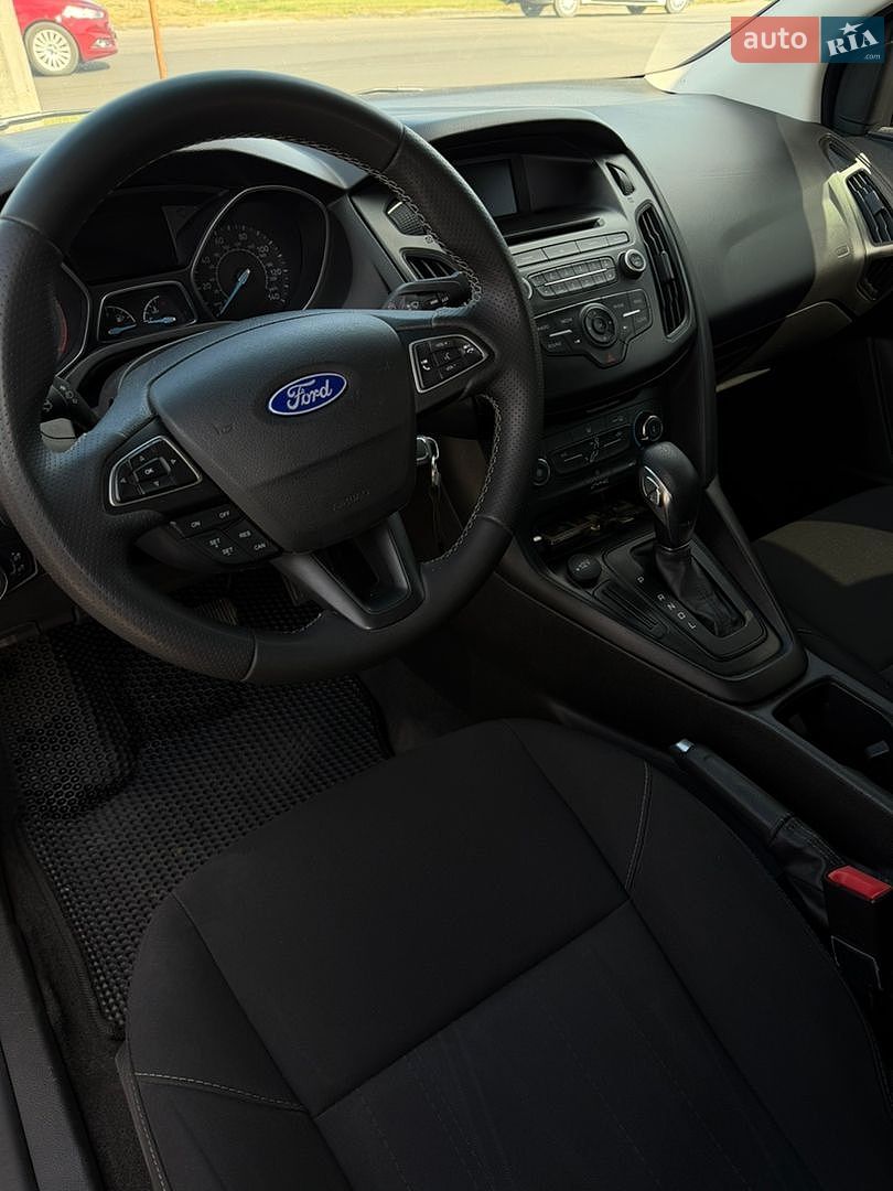 Ford Focus 2018 VIN 1FADP3F28JL291232 фото оголошення 14 з 19