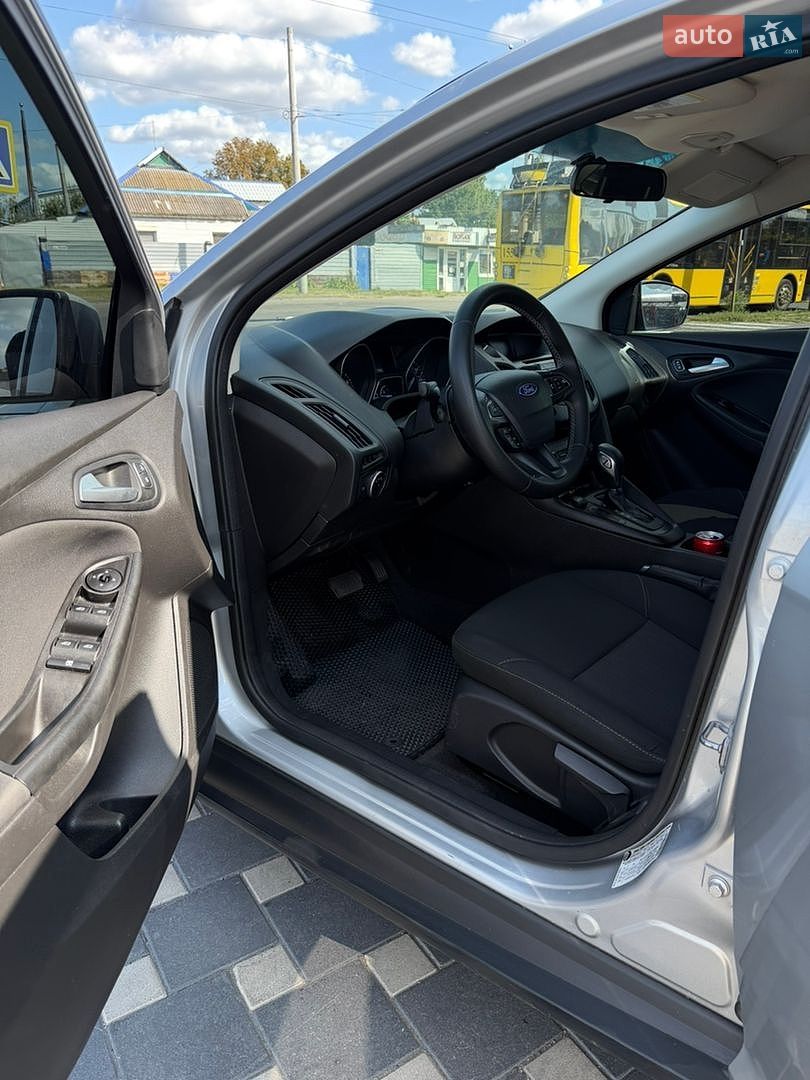 Ford Focus 2018 VIN 1FADP3F28JL291232 фото оголошення 16 з 19