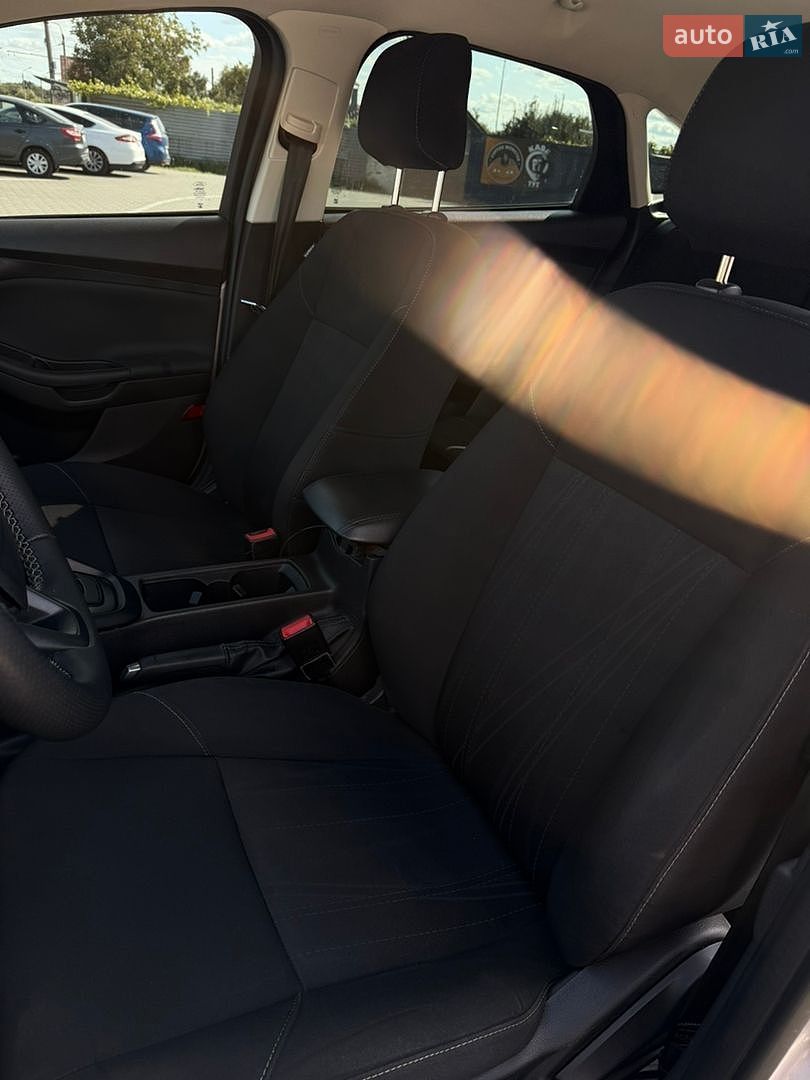Ford Focus 2018 VIN 1FADP3F28JL291232 фото оголошення 17 з 19