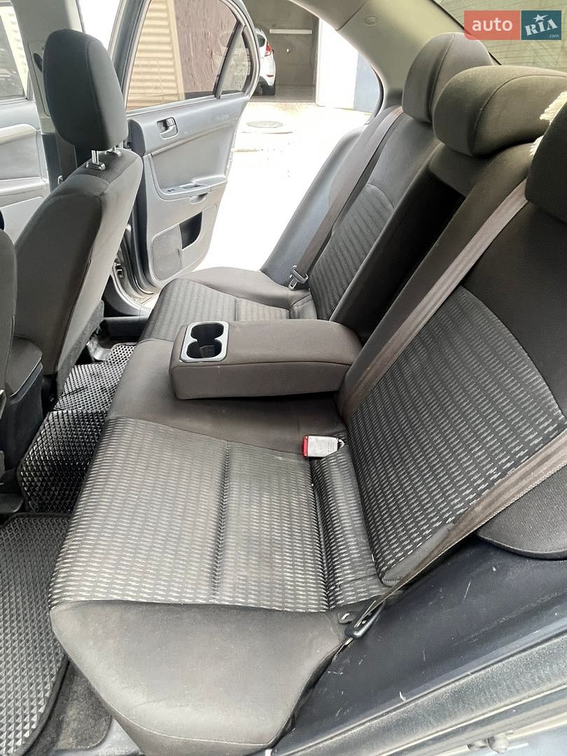 Mitsubishi Lancer 2013 VIN JA32U2FU9DU022014 фото оголошення 13 з 49