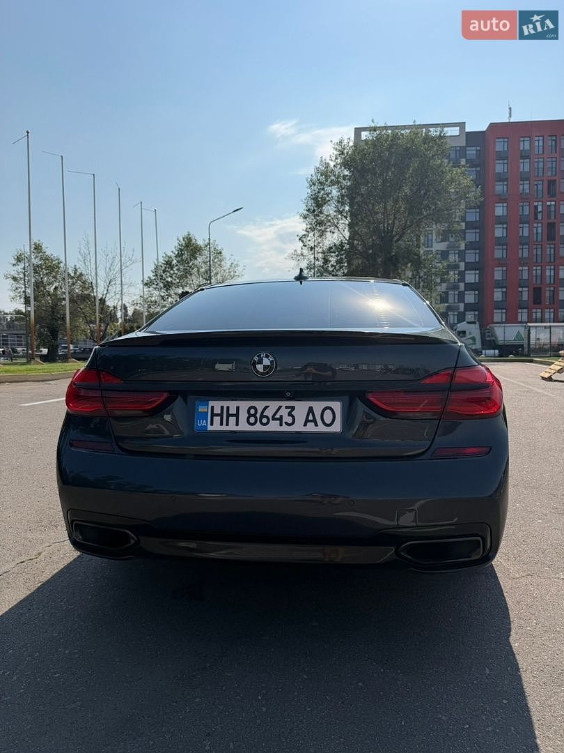 BMW 7 Series 2015 VIN WBA7E2C55GG547332 фото оголошення 7 з 13