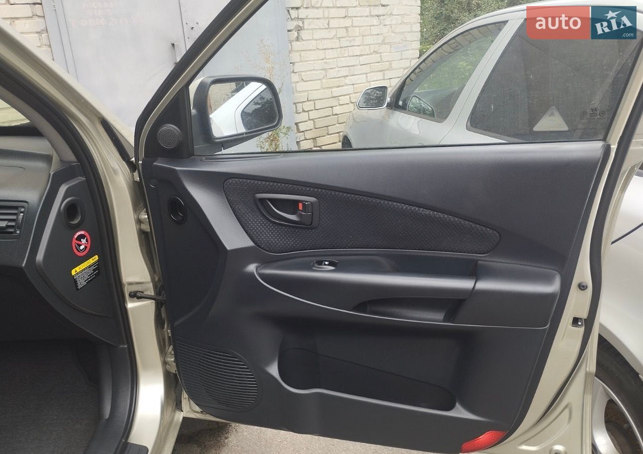 Hyundai Tucson 2007 VIN KMHJN81BP7U680335 фото оголошення 11 з 17