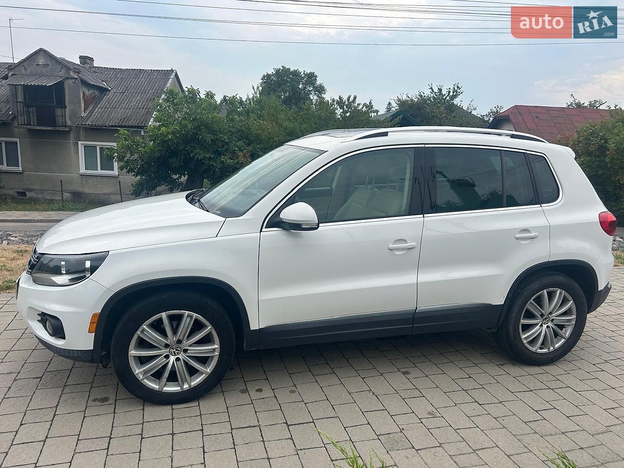 Volkswagen Tiguan 2013 VIN WVGAV3AX8EW545897 фото оголошення 2 з 12