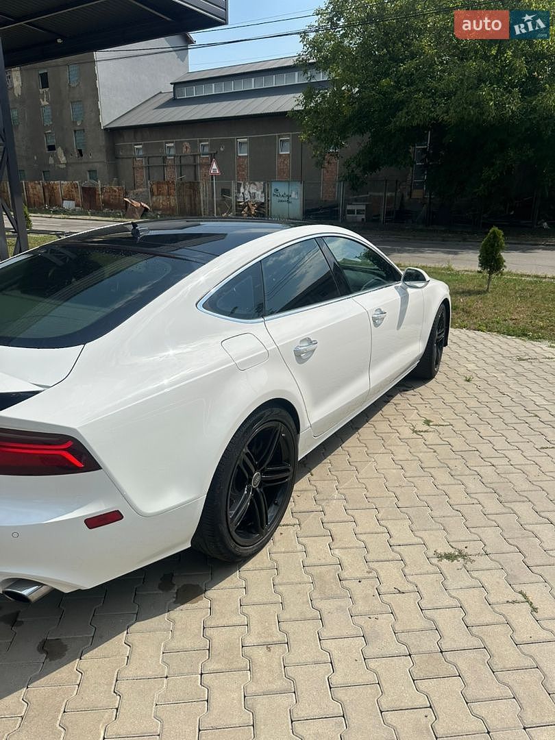 Audi A7 Sportback 2014 VIN WAUWGAFC7FN003791 фото оголошення 3 з 21