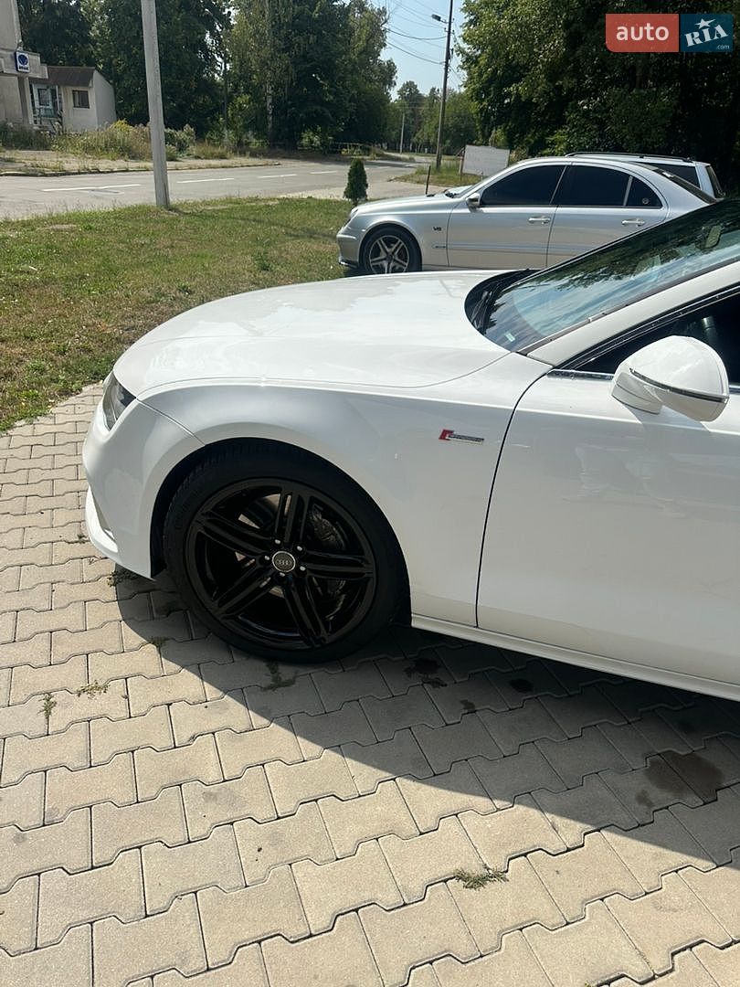 Audi A7 Sportback 2014 VIN WAUWGAFC7FN003791 фото оголошення 4 з 21