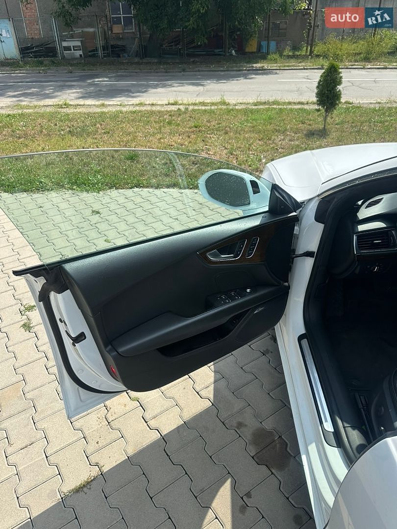 Audi A7 Sportback 2014 VIN WAUWGAFC7FN003791 фото оголошення 12 з 21