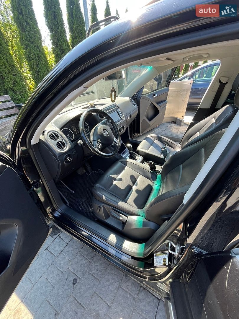 Volkswagen Tiguan 2011 VIN WVGAV7AXXCW520648 фото оголошення 7 з 10