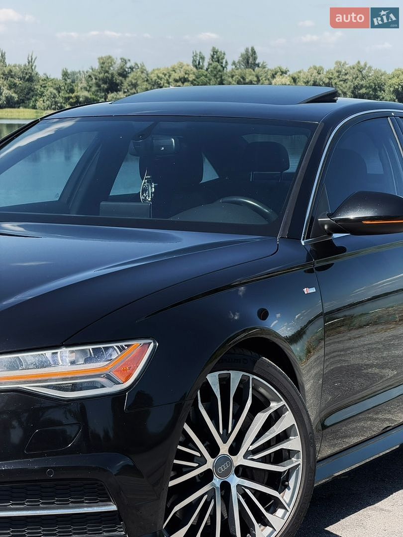 Audi A6 2015 VIN WAUGFAFC9GN013389 фото оголошення 2 з 36