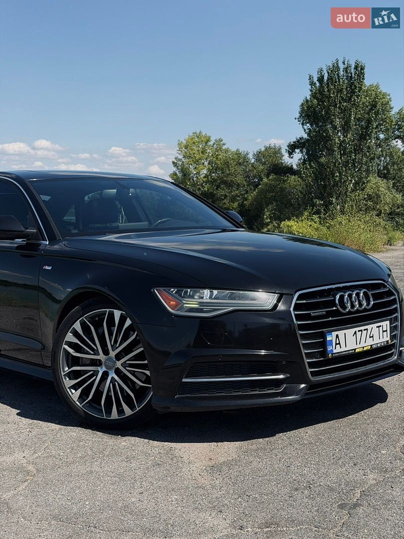 Audi A6 2015 VIN WAUGFAFC9GN013389 фото оголошення 6 з 36