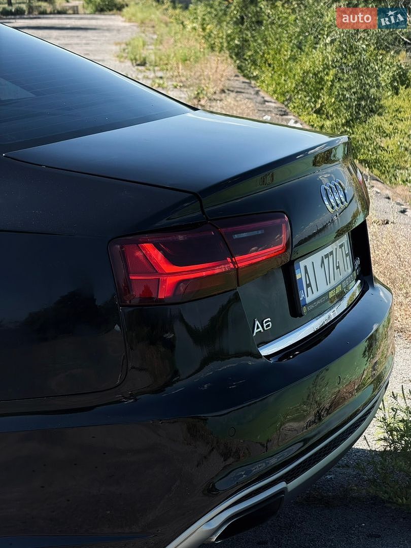 Audi A6 2015 VIN WAUGFAFC9GN013389 фото оголошення 10 з 36