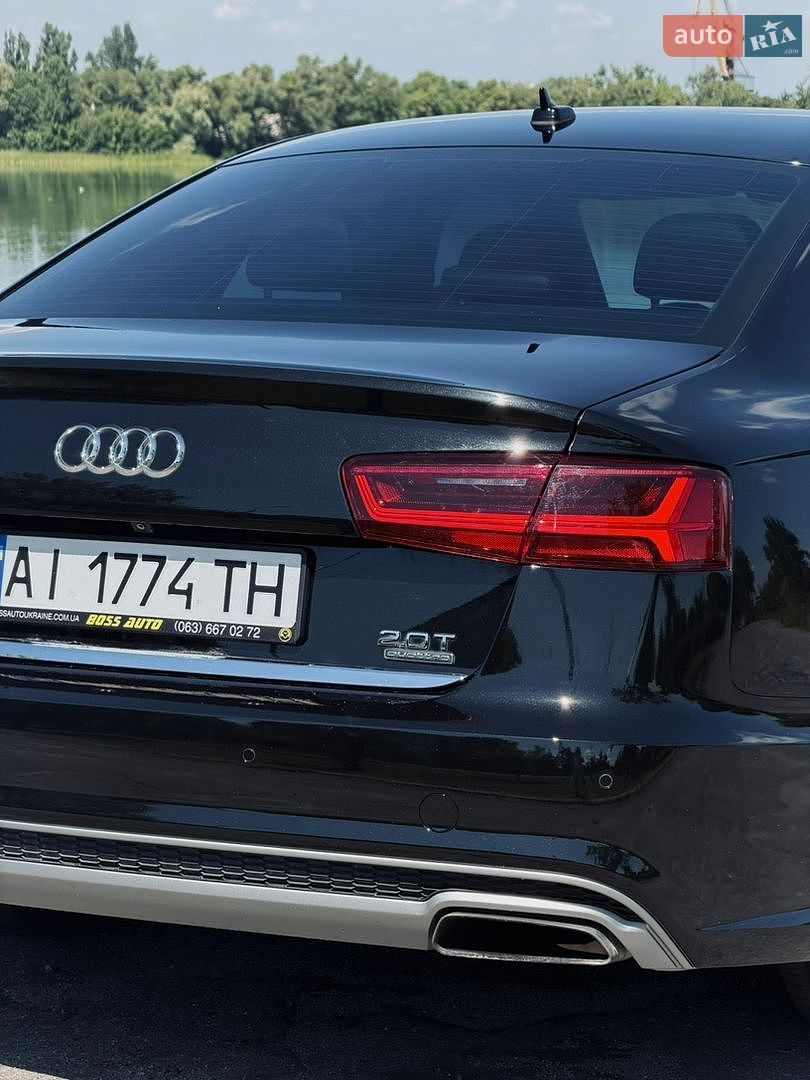 Audi A6 2015 VIN WAUGFAFC9GN013389 фото оголошення 13 з 36
