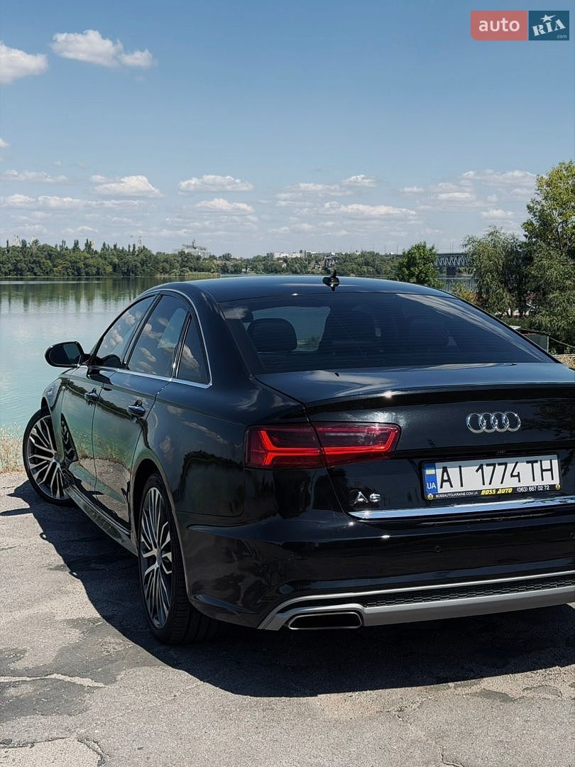 Audi A6 2015 VIN WAUGFAFC9GN013389 фото оголошення 15 з 36