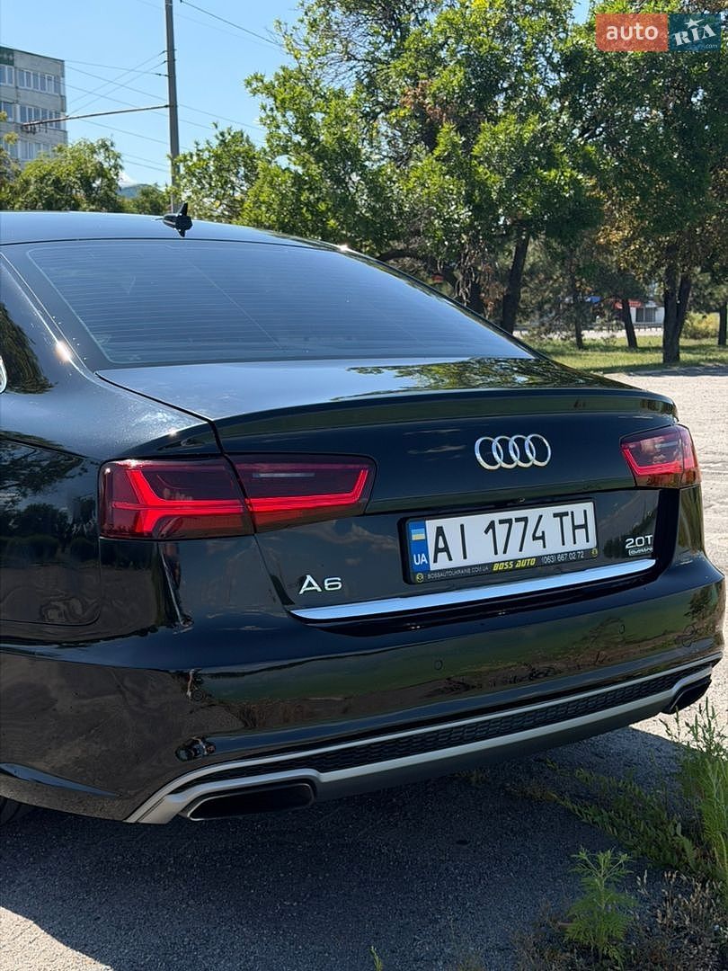 Audi A6 2015 VIN WAUGFAFC9GN013389 фото оголошення 12 з 36
