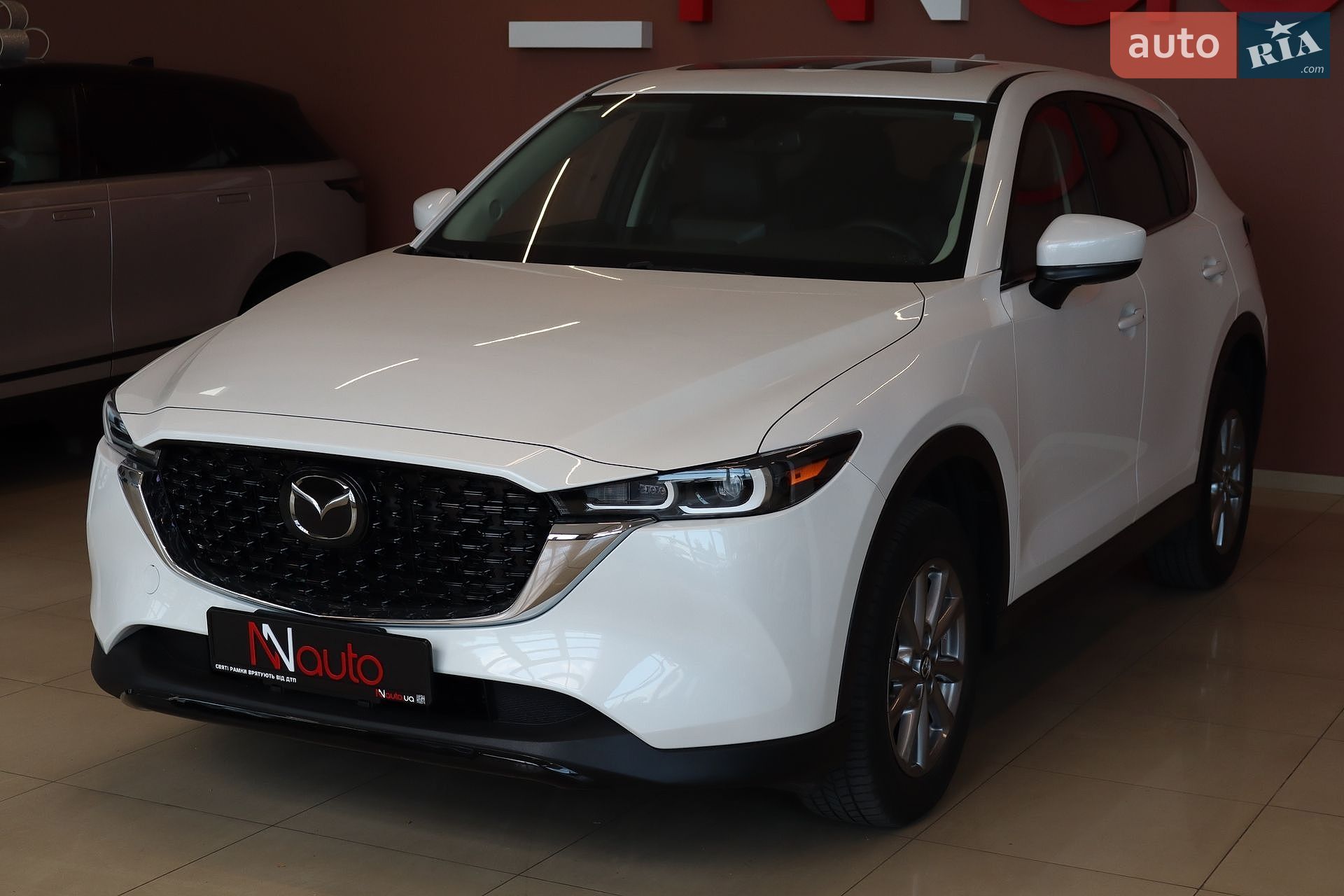 Mazda CX-5 2023 VIN JM3KFBCMXP0268380 фото оголошення 2 з 47