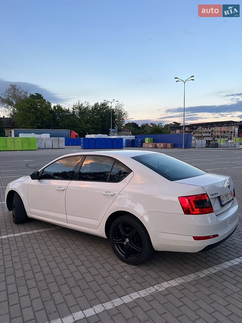Skoda Octavia 2013 VIN TMBAJ7NE4E0034528 фото оголошення 12 з 21