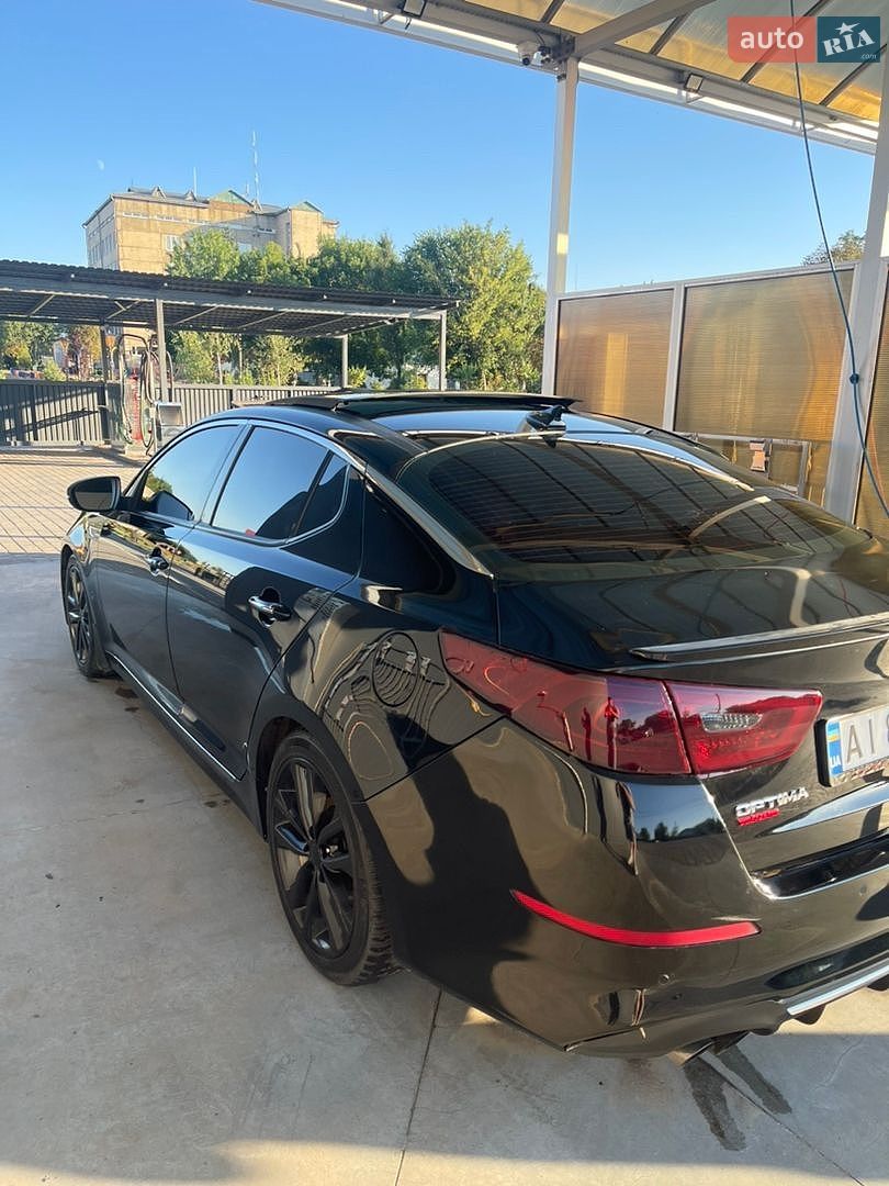 Kia Optima 2014 VIN 5XXGR4A66EG318953 фото оголошення 4 з 35
