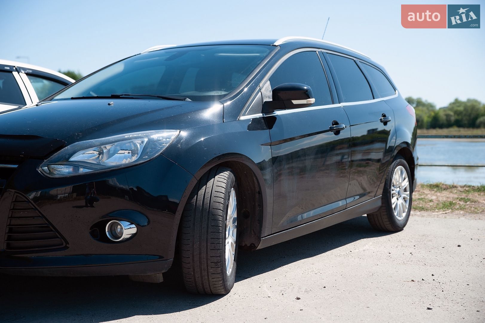 Ford Focus 2014 VIN WF0LXXGCBLEL65864 фото оголошення 2 з 24