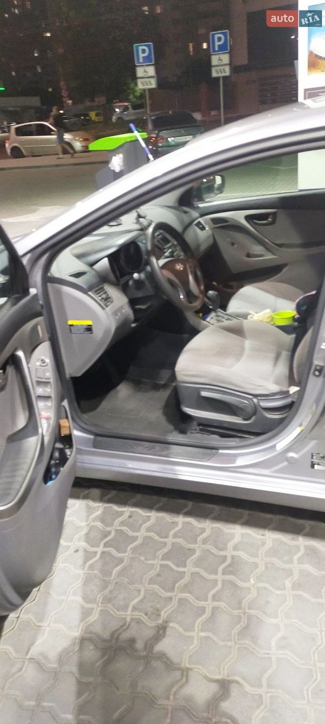 Hyundai Elantra 2013 VIN KMHDH4AE3DU948205 фото оголошення 9 з 10