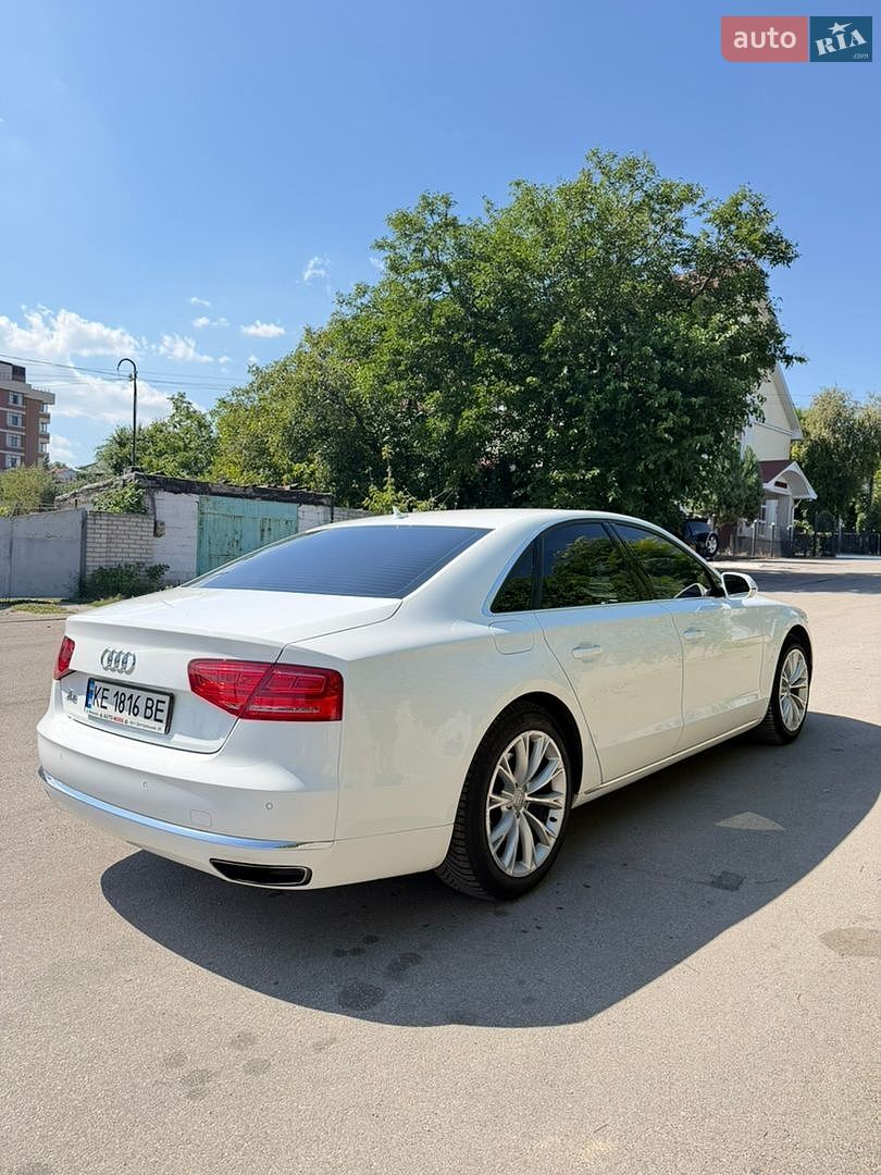 Audi A8 2012 VIN WAUZZZ4H5DN012040 фото оголошення 13 з 19