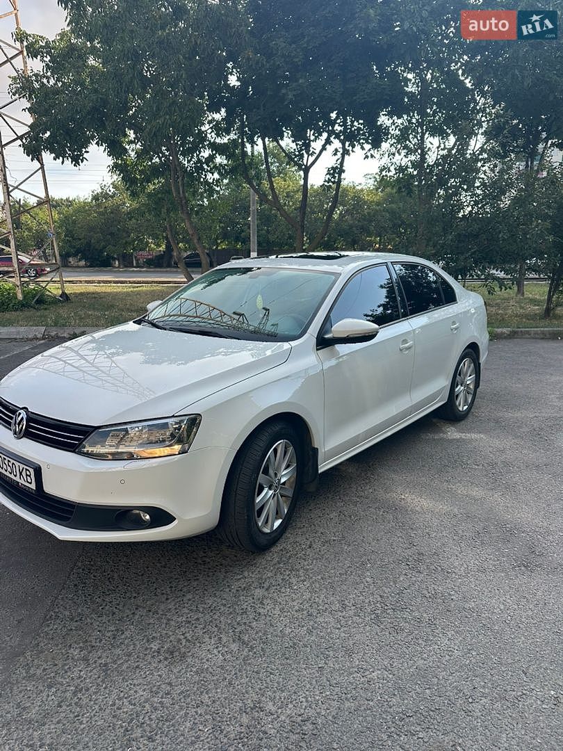 Volkswagen Jetta 2014 VIN WVWZZZ16ZEM035340 фото оголошення 2 з 11