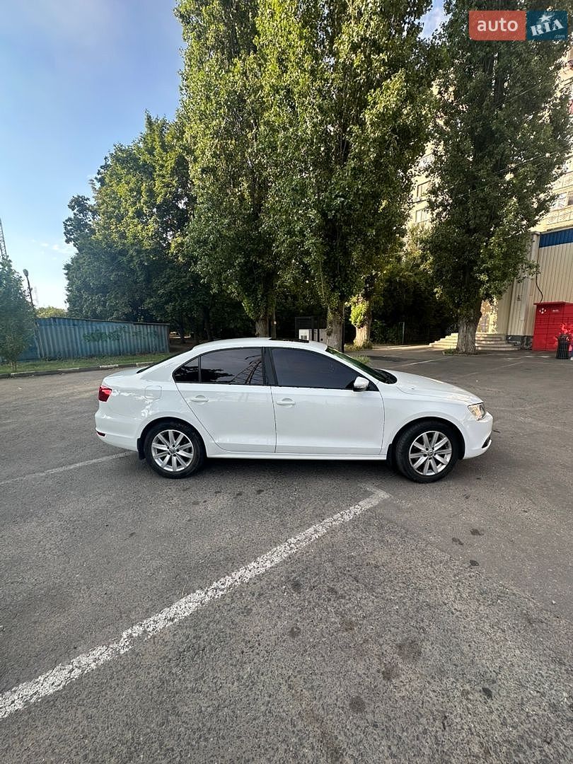 Volkswagen Jetta 2014 VIN WVWZZZ16ZEM035340 фото оголошення 5 з 11