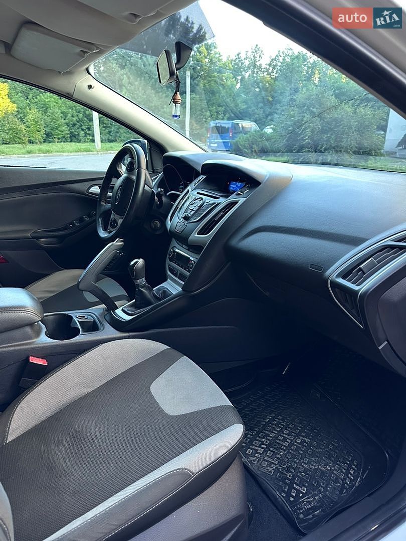 Ford Focus 2012 VIN WF0KXXGCBKCB49520 фото оголошення 16 з 29