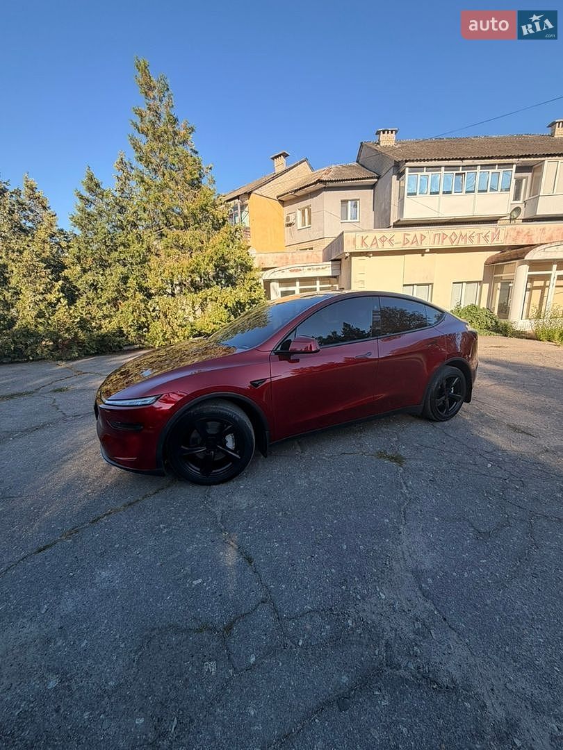 Tesla Model Y 2025 VIN 7SAYGDEE5TF329828 фото оголошення 5 з 37