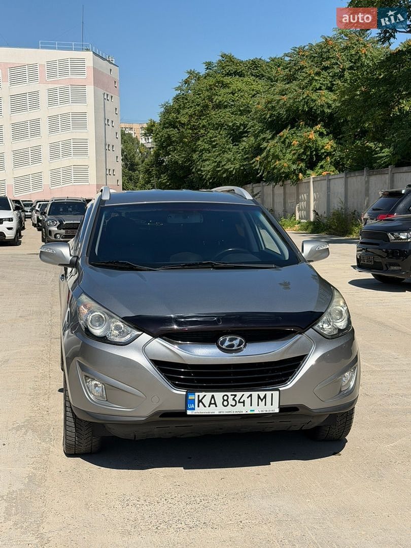 Hyundai Tucson 2012 VIN KMHJU81VBCU499603 фото оголошення 2 з 35